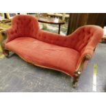 A VICTORIAN SHOW FRAME BUTTON BACK SALON SETTEE.