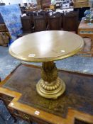 A CARVED GILTWOOD CIRCULAR LOW OCCASIONAL TABLE.