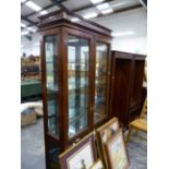 A MODERN GEORGIAN STYLE WALNUT GLAZED DISPLAY CABINET WITH GLASS SHELVES. W 103 X D 39 X H 209cms.