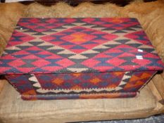 ANTIQUE PINE BLANKET BOX LATER UPHOLSTERED WITH FLAT WEAVE KELIM CARPET. W 86 X D 46 X H 39cms.