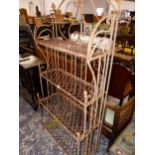 A WROUGHT IRON FOLDING CONSERVATORY STAND. W 69 X D 32 X H 150cms.