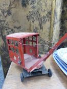 A VINTAGE TRIANG CRANE TOY.