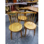 FOUR SIMILAR WELSH COMB BACK PENNY SEAT KITCHEN CHAIRS TO INCLUDE ONE ARMCHAIR.