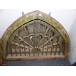 A LARGE EASTERN HARD WOOD FRAMED GOTHIC FAN LIGHT WITH LATER INSERTED MIRROR PANELS. W 126 X H