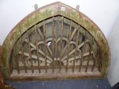 A LARGE EASTERN HARD WOOD FRAMED GOTHIC FAN LIGHT WITH LATER INSERTED MIRROR PANELS. W 126 X H