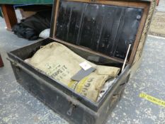 A TIN TRUNK AND CONTENTS.