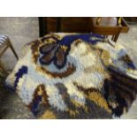 A MID CENTURY WOOL PILE RUG, BY ARROYA, IN SHADES OF BLUE AND GREY. 87 X 139cms.