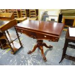 A CARVED MAHOGANY VICTORIAN TEA TABLE WITH SCROLL LEGS.