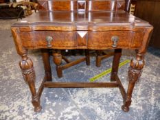 A SMALL OAK SIGNLE DRAWER HALL TABLE ON CARVED LEGS. W 76 X D 44 X H 81cms.