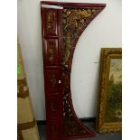 AN ORIENTAL CARVED LACQUERED WOOD ARCHED PANEL.