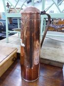 A LARGE ARTS AND CRAFTS COPPER EWER WITH HINGED LID.
