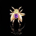 A VICTORIAN STYLE SILVER GILT STONE SET INSECT RING. FINGER SIZE Q. WEIGHT 4.3grms.