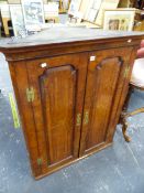 A GEORGE III BURR WALNUT AND INLAID TWO PANEL DOOR CORNER CABINET, WITH SHAPED SHELF INTERIOR. W