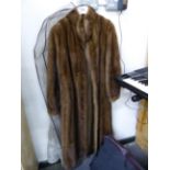 A SAGA MINK LADIES FULL LENGTH COAT, LABELLED MADE IN KOREA, SIZE 10.