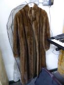 A SAGA MINK LADIES FULL LENGTH COAT, LABELLED MADE IN KOREA, SIZE 10.