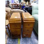 A PAIR OF ART DECO STYLE WALNUT THREE DRAWER BEDSIDE STANDS.