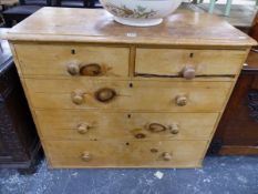 A SMALL VICTORIAN PINE CHEST OF DRAWERS.