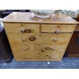A SMALL VICTORIAN PINE CHEST OF DRAWERS.