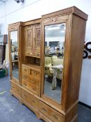 AN EDWARDIAN SATIN WALNUT COMPACTUM WARDROBE.