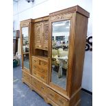 AN EDWARDIAN SATIN WALNUT COMPACTUM WARDROBE.