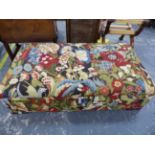 A LARGE BANQUETTE STOOL, UPHOLSTERED IN TAPESTRY FABRIC. L 147 X D 81 X H42 cms.