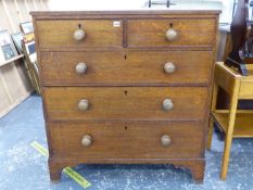 A GEORGE III OAK CHEST OF TWO SHORT AND THREE LONG DRAWERS. W 97 X D 51 X H 105cms.