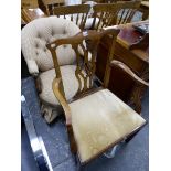 A VICTORIAN BUTTON BACK ARMCHAIR, AND A GEORGIAN MAHOGANY DINING ARM CHAIR.