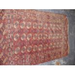 TWO ANTIQUE RUGS. BOKHARA 149 X 214cms, SMALL RUG 141 X 91cms,
