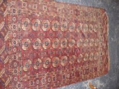 TWO ANTIQUE RUGS. BOKHARA 149 X 214cms, SMALL RUG 141 X 91cms,