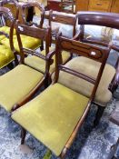 THREE GEORGIAN DINING CHAIRS AND A VICTORIAN LARGE ARM CHAIR.