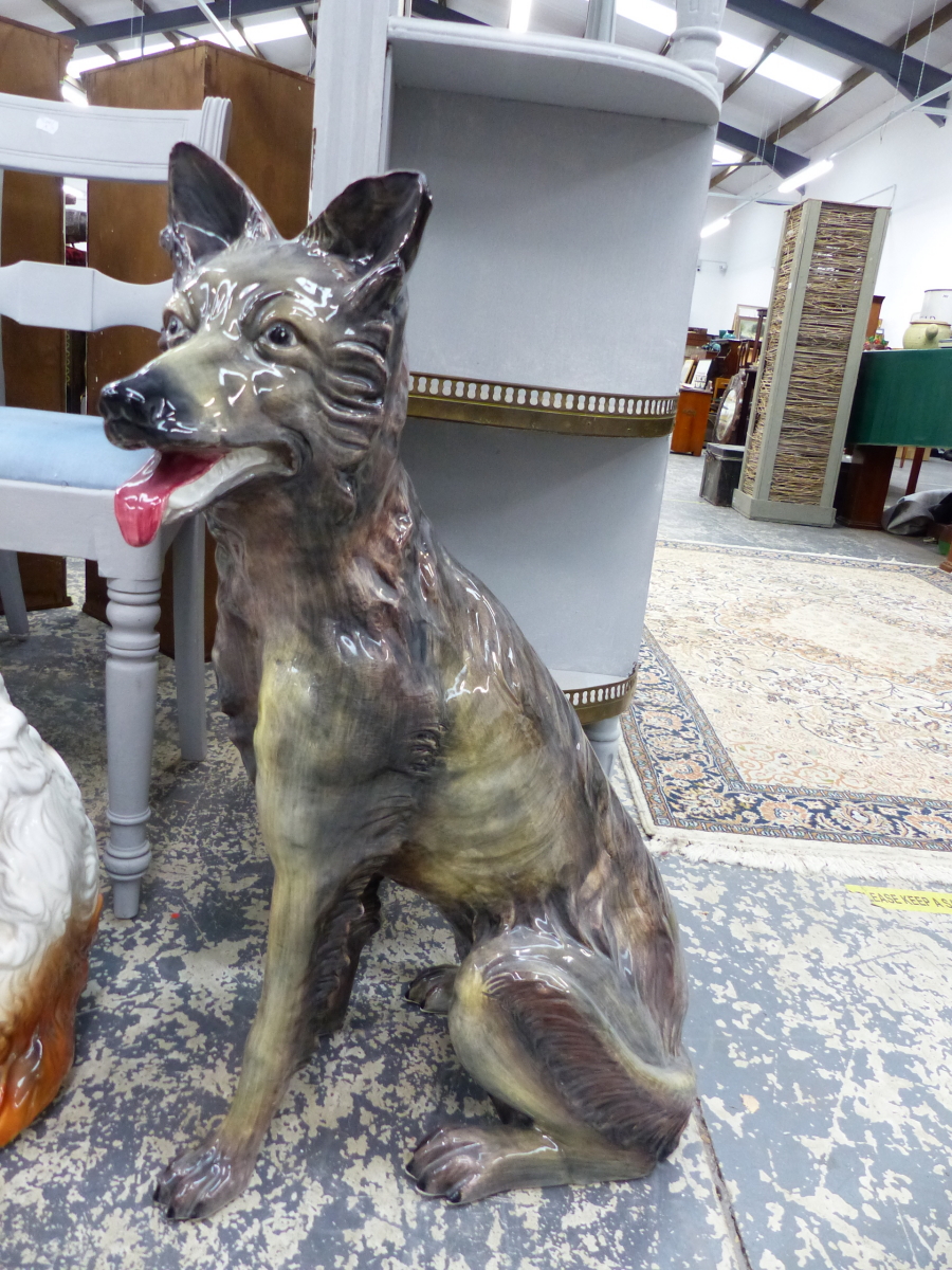 A LARGE POTTERY FIGURE OF A GERMAN SHEPHERD.