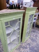 TWO SIMILAR PAINTED ASTRAGAL GLAZED CORNER CABINETS.