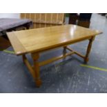 AN 18th C. STYLE PALE OAK REFECTORY DINING TABLE ON TURNED LEGS. L 174 X W 97 X H 76cms.