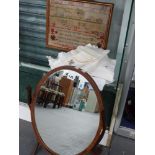 A FRAMED ALPHABET SAMPLER DATED 1876, VARIOUS TABLE LINENS AND A SWING MIRROR.