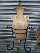 A TABLE LAMP IN THE FORM OF AN ARCHAIC URN.
