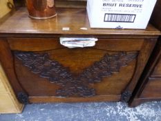 AN ANTIQUE OAK FALL FRONT SIDE CABINET.