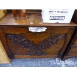 AN ANTIQUE OAK FALL FRONT SIDE CABINET.