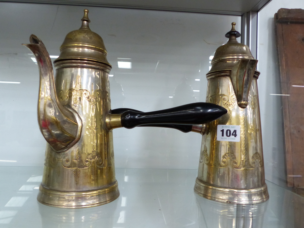 A PAIR OF SILVER PLATED COFFEE POTS.