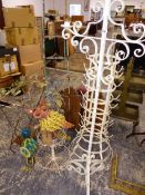 A VINTAGE BOTTLE DRYING RACK, A LARGE WROUGHT IRON PAN STAND, A WASH STAND, CANDLE STANDS, A