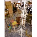 A VINTAGE BOTTLE DRYING RACK, A LARGE WROUGHT IRON PAN STAND, A WASH STAND, CANDLE STANDS, A