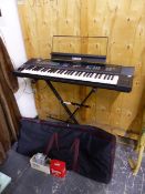 A YAMAHA DSR-1000 KEYBOARD, STAND AND FOOT PEDAL.