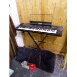A YAMAHA DSR-1000 KEYBOARD, STAND AND FOOT PEDAL.