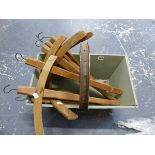 A QUANTITY OF RUSTIC SCHOOL CLOAK HANGERS AND A TRUG.