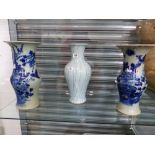 TWO ORIENTAL BLUE AND WHITE VASES AND A LARGE CRACKLE GLAZE VASE.