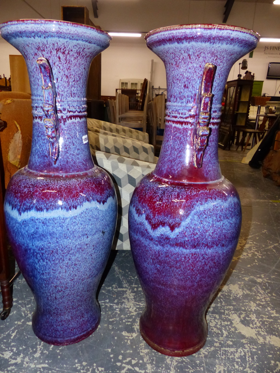 A PAIR OF LARGE ORIENTAL LARVA GLAZED FLOOR URNS, TOGETHER WITH AN ART DECO STYLE LARGE URN. THE - Image 6 of 10