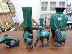 A GROUP OF GREEN LAVA GLAZED VASES AND FIGURINES. BLUE MOUNTAIN POTTERY, MADE IN CANADA.