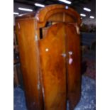 AN ART DECO STYLE WALNUT SMALL WARDROBE W 91 X D 48 X H 170cms.