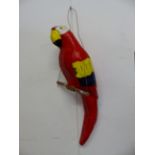 A LARGE PAPIER MACHE PIANTED PARROT ON HANGING SUPPORT. H 115cms.