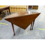 AN ANTIQUE MAHOGANY DROP LEAF CORNER TABLE ON TURNED LEGS WITH CLUB FEET.
