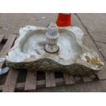 A MARBLE FOUNTAIN BASE.